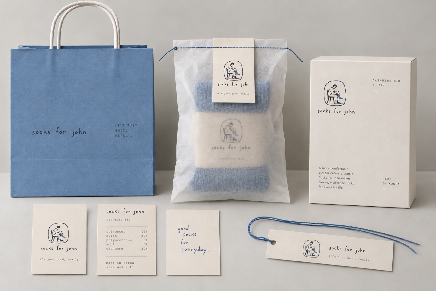 Socks for John packaging in paper blue and ivory